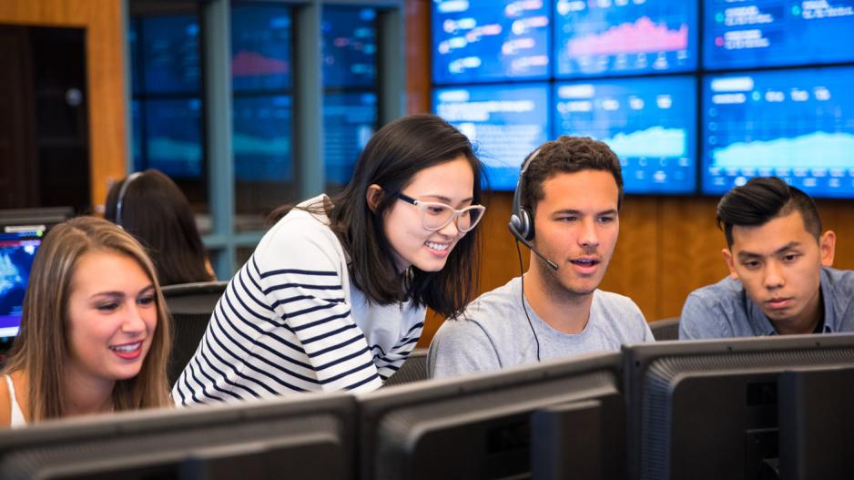Students at Computer in Trading Room