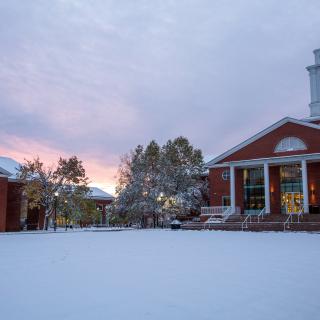 Snowy sunset on Bentley campus