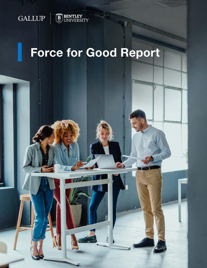 People standing at an office table for the report cover