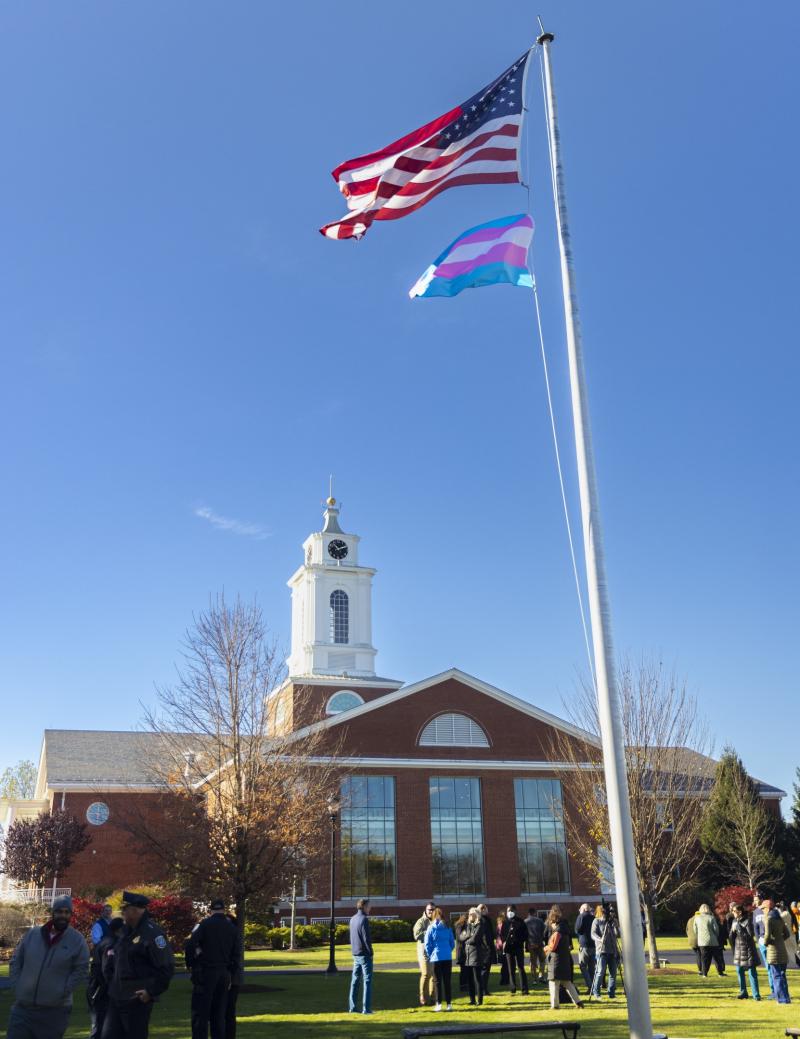 The trans pride flag flying on campus