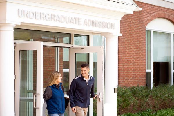 two students walk out of undergraduate admission office 